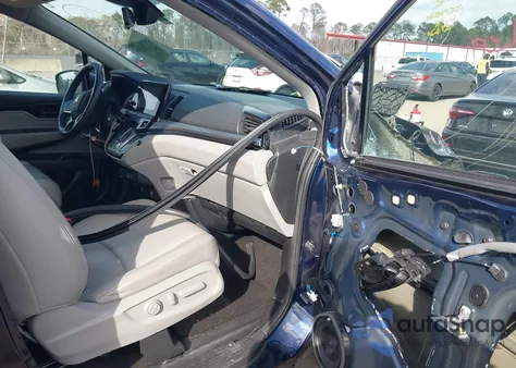 2022 Honda Odyssey Touring z USA, uszkodzony, nr VIN 5FNRL6H8XNB057620